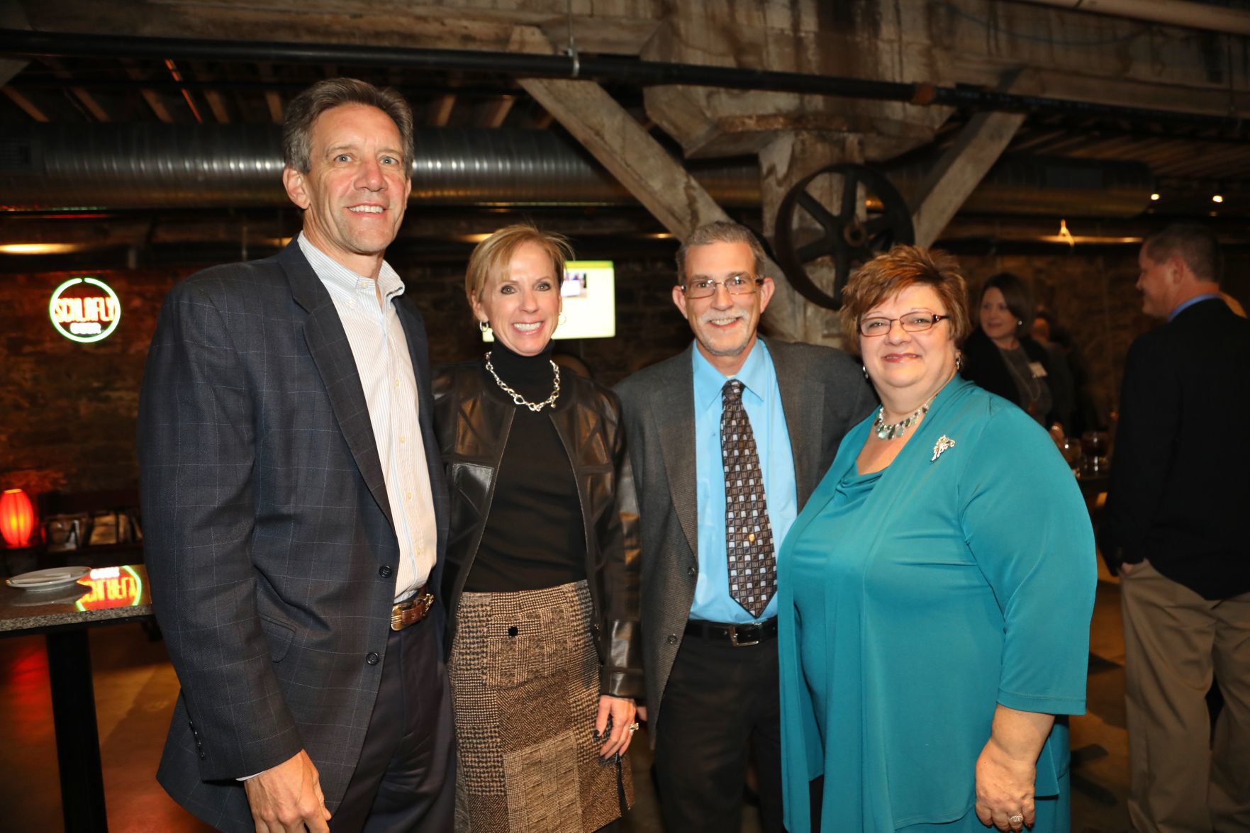 Brian and Kris Hogan, Tracy and Christine Lato